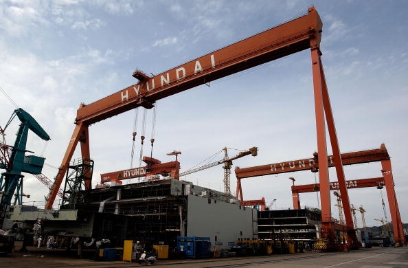 A ship under construction sits at the dock of Hyundai Heavy Industries 