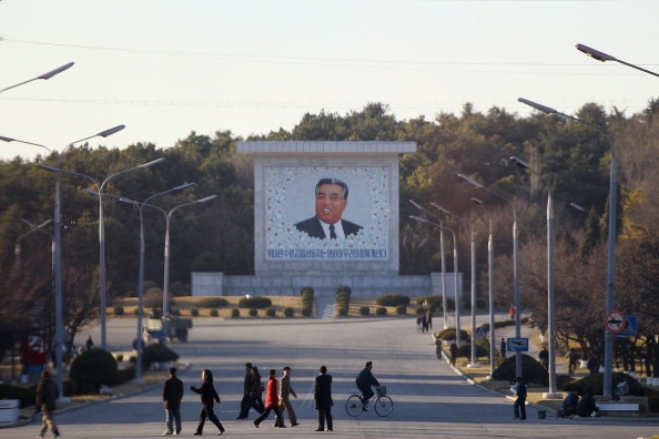 A mural of Kim Il Sung, founder of North Korea, stands in Pyongyang, North Korea. Now, the country runs again at GMT +8.5 time zone