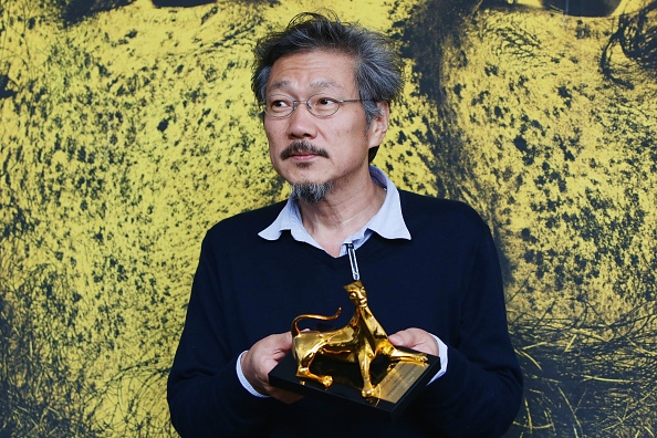 Director Hong Sangsoo poses with the Pardo d'Oro (Golden Leopard) on August 15, 2015 in Locarno, Switzerland.