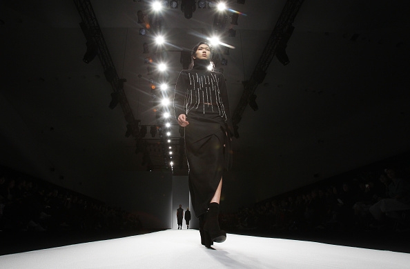 A model showcases designs on the runway during the Soulpot Studio show.