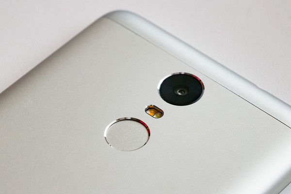 Fingerprint scanner on the back of a Xiaomi Redmi Note 3 smartphone